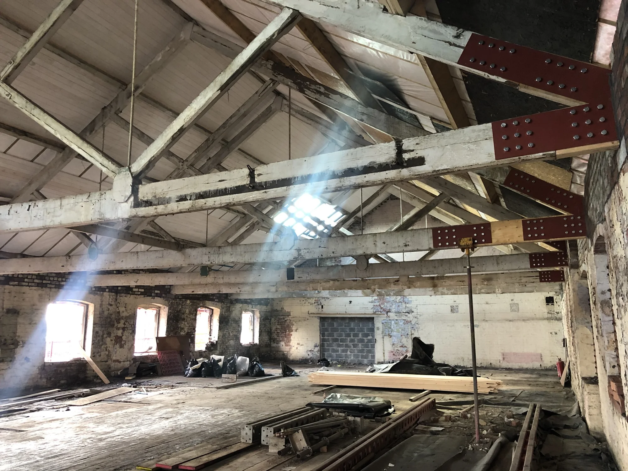 Existing roof trusses and structural reinforcement at Rutland Mills during the works