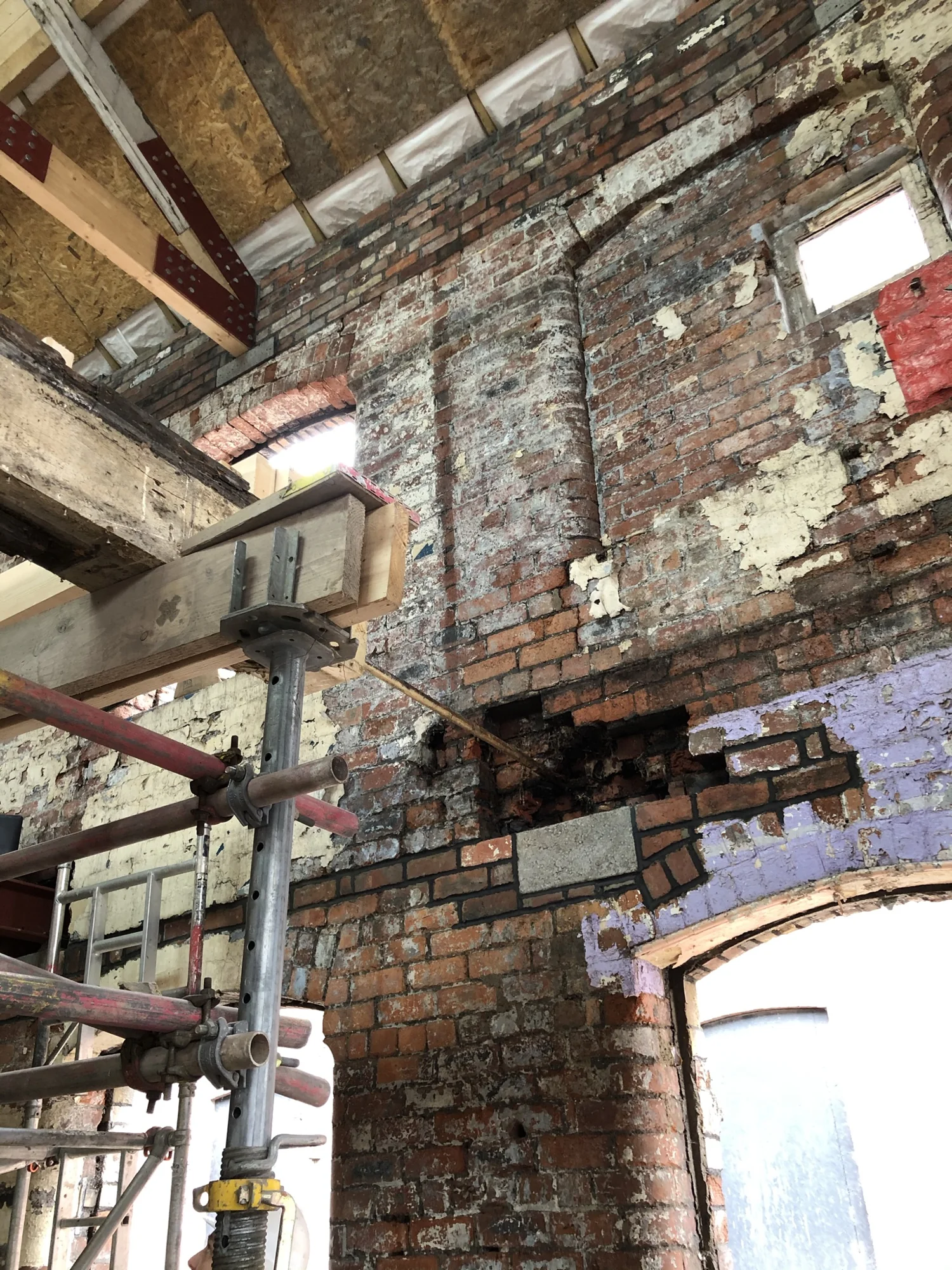 Structural timber repair at a wall bearing at Rutland Mills during the works