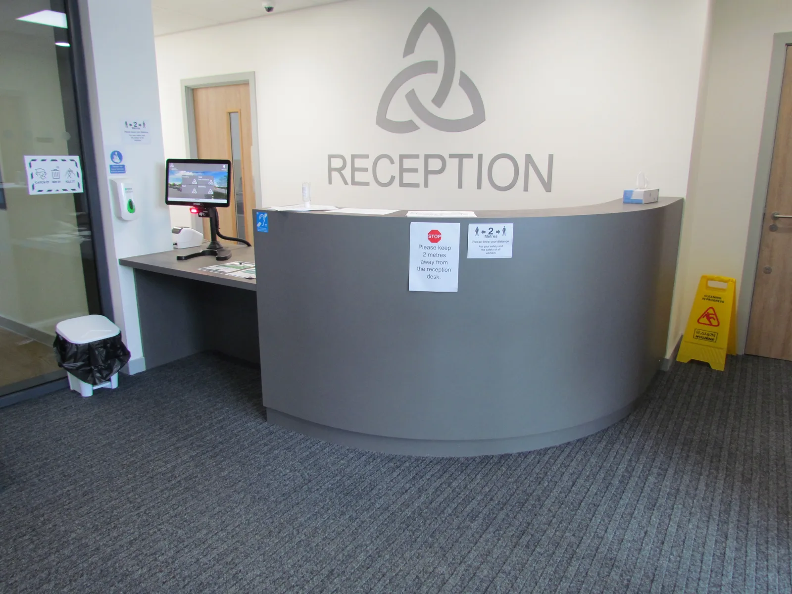 Bespoke curved reception desk made by CJ Joinery at Laurus Ryecroft High School